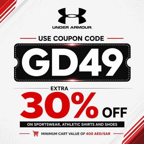 An image showing the Under Armour brand logo and the text USE COUPON CODE GD49. Large red text indicates EXTRA 30% OFF applied to SPORTSWEAR, ATHLETIC SHIRTS AND SHOES with a MINIMUM CART VALUE OF 400 AED or SAR.